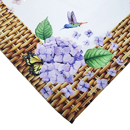 Decorative napkin with purple flowers, green leaves, and butterflies on a woven background
