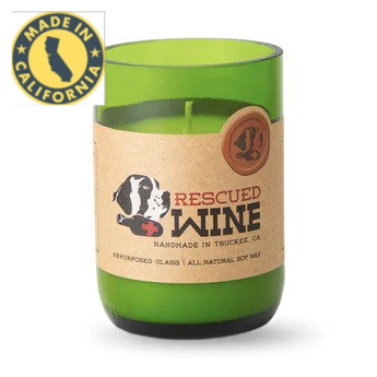 Green candle in a repurposed wine glass with a label and 'Made in California' badge.